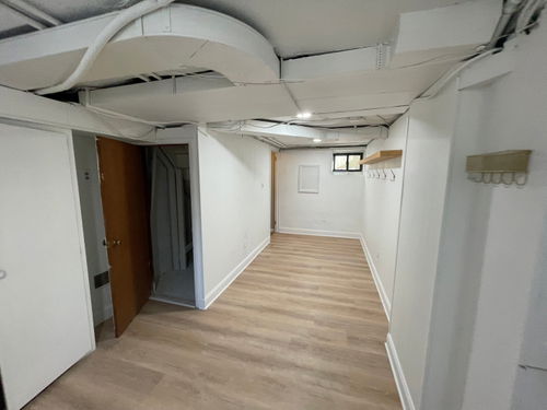 New Providence basement remodel with an open, painted ceiling