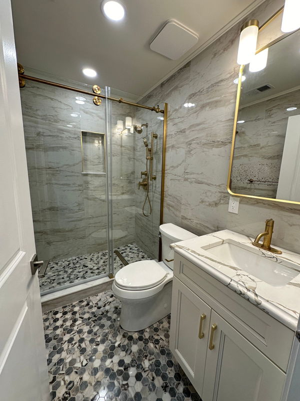 Chatham bathroom with brushed-gold fixtures and hex mosaic floor — gallery image 7