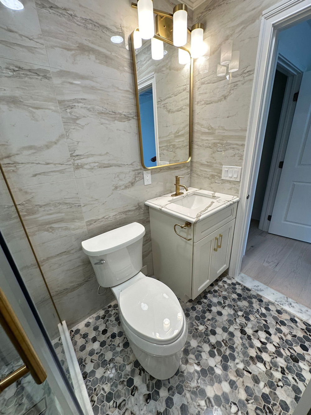 Chatham bathroom with brushed-gold fixtures and hex mosaic floor — gallery image 2