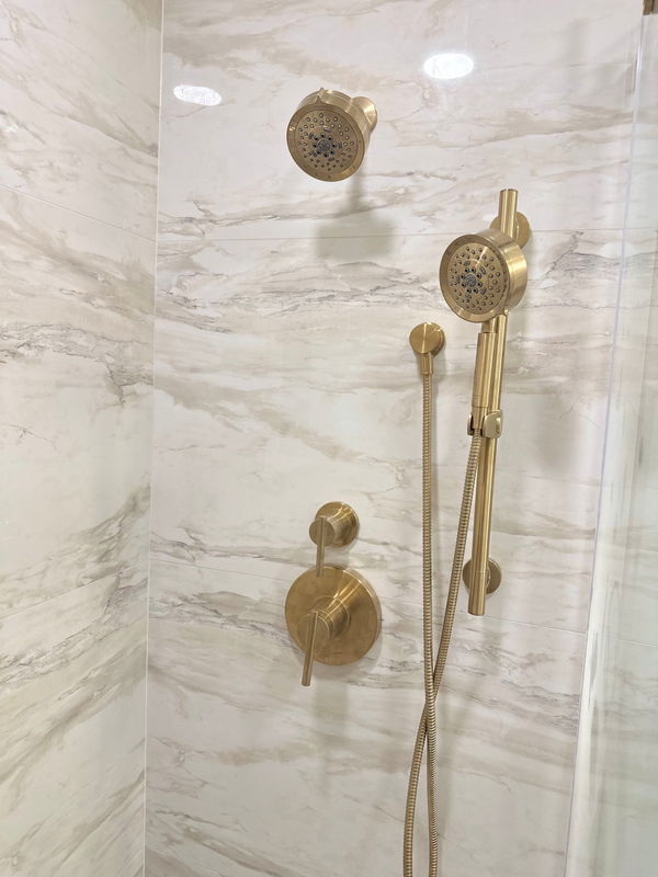 Chatham bathroom with brushed-gold fixtures and hex mosaic floor — gallery image 6