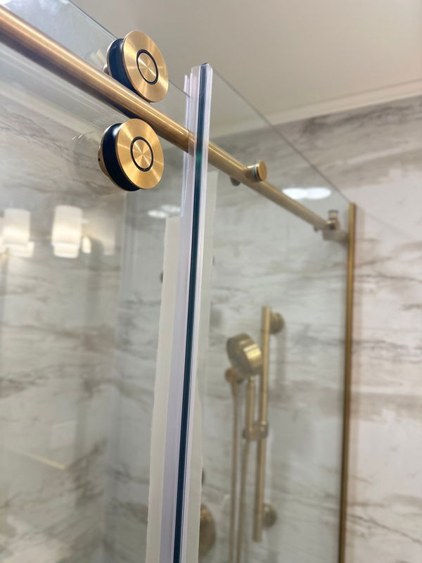 Chatham bathroom with brushed-gold fixtures and hex mosaic floor — gallery image 3