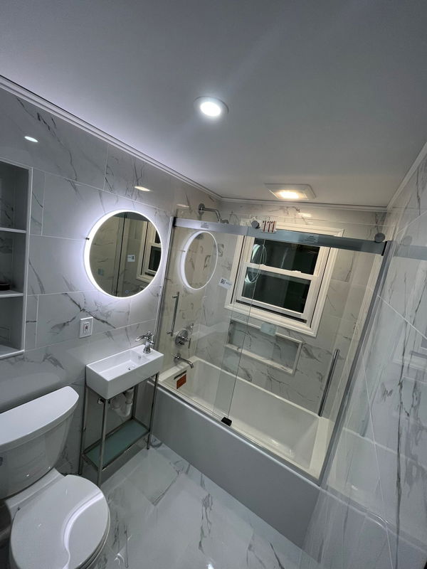 Little Falls bathroom remodeling with marble-look tile — gallery image 3