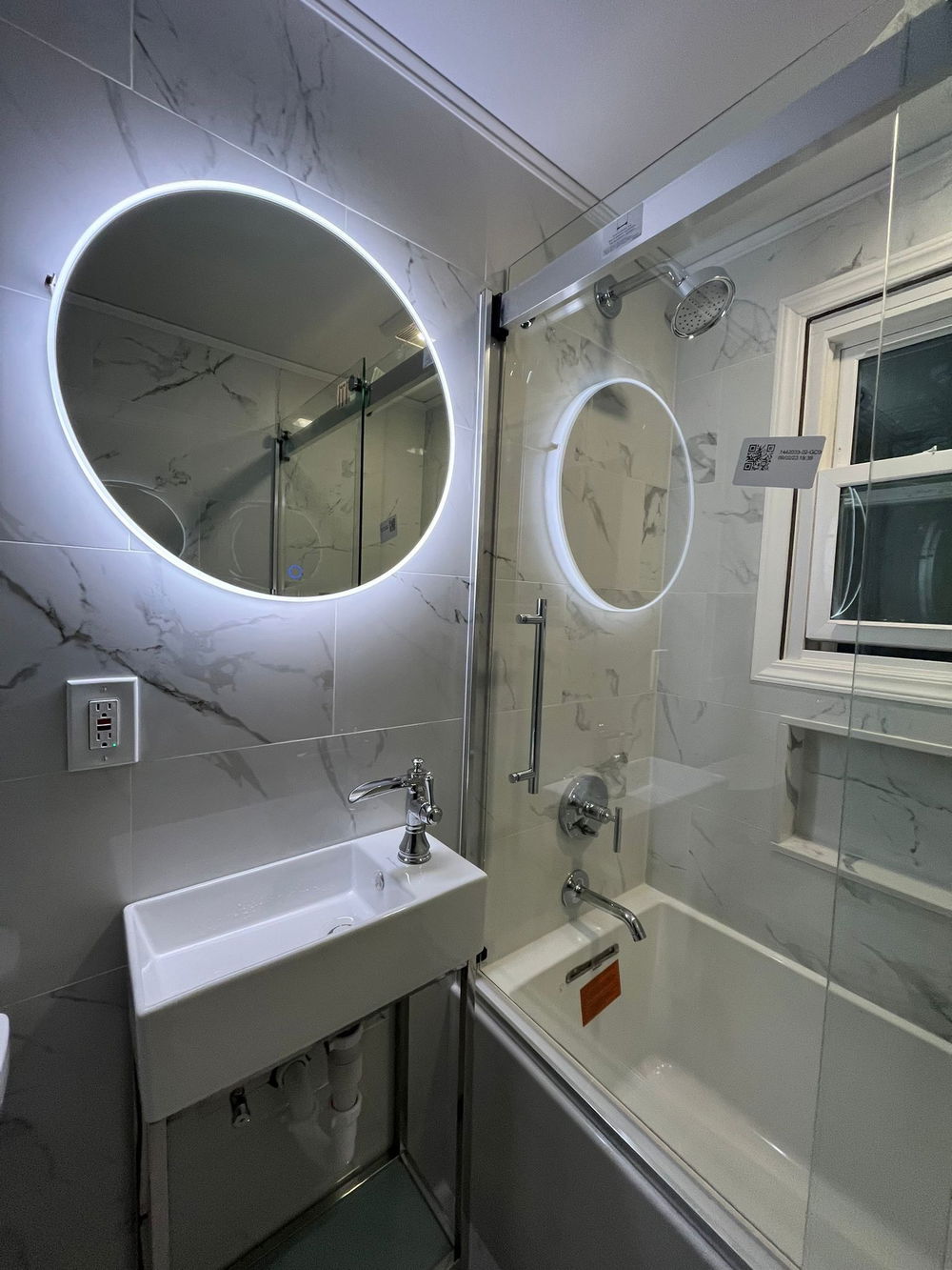 Little Falls bathroom remodeling with marble-look tile — gallery image 2