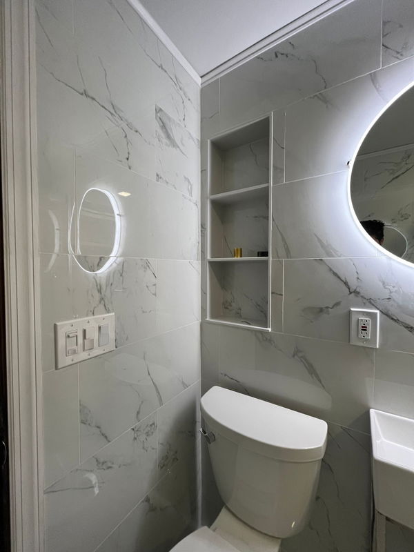 Little Falls bathroom remodeling with marble-look tile — gallery image 6