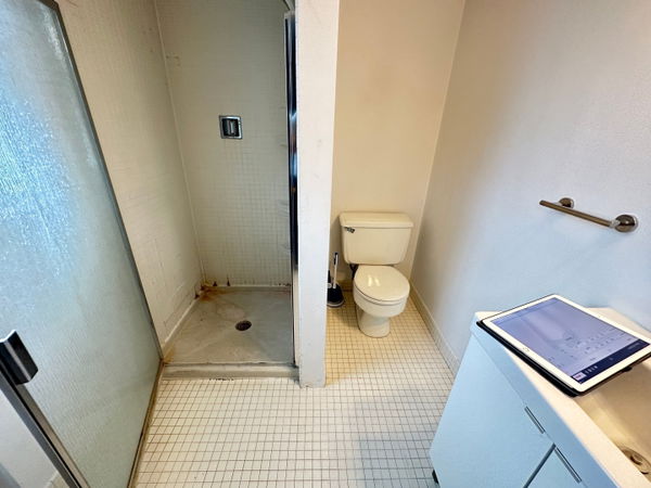 Livingston bathroom remodeling with marble-look tile — gallery image 4