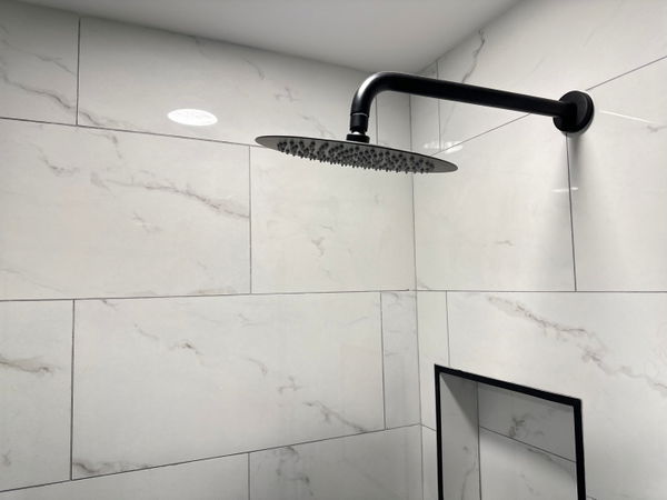 Livingston bathroom remodeling with marble-look tile — gallery image 6